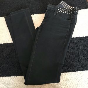 Washed black skinny studded jeans